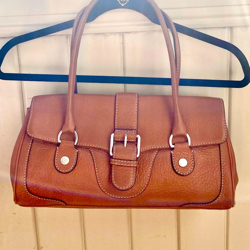 Michael Kors. ( not sure if authentic) real leather handbags.